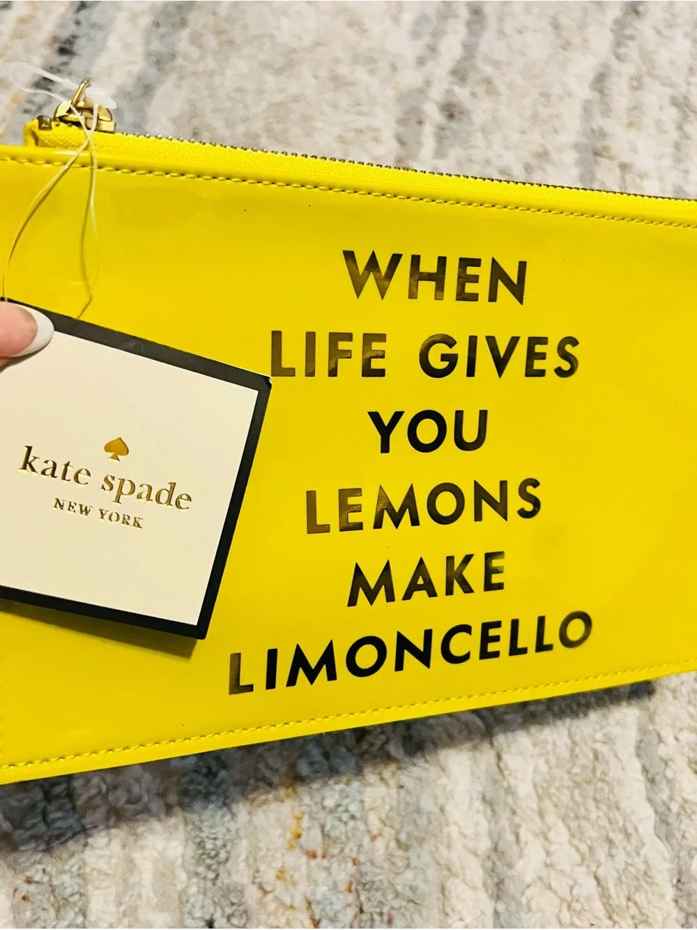 kate spade glossy yellow zip pouch.        NWT